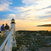 Lighthouse on rocky beach